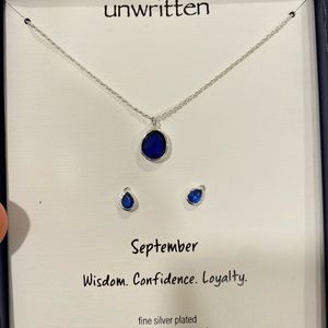 Unwritten sapphire necklace and earring set